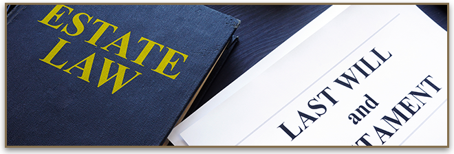 Elder Law book and Last Will & Testament document sitting on table.